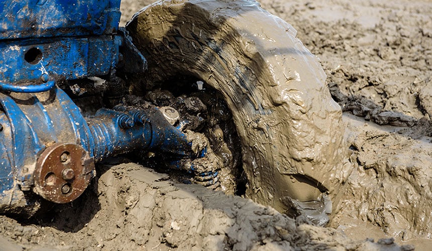 Clay soil saturated with water increases the risk of getting stuck in the mud