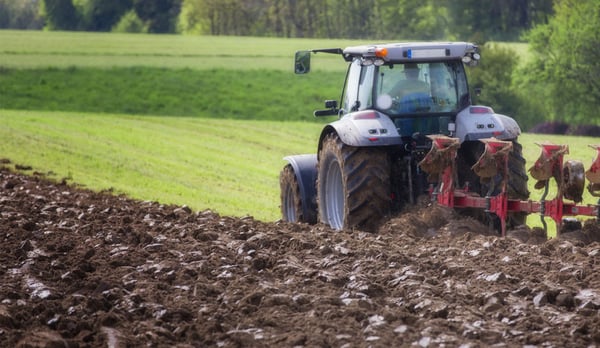 work in the fields with the tractor